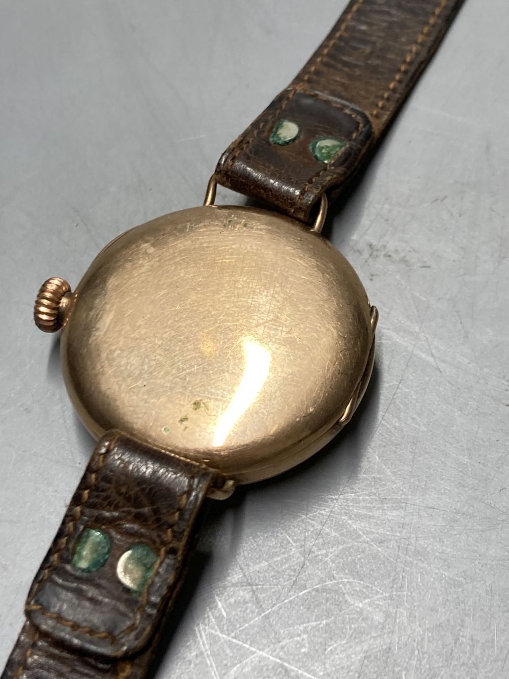 A 9ct gold vintage wristwatch with circular dial and subsidiary seconds dial (converted) and three other 9ct gold watches,